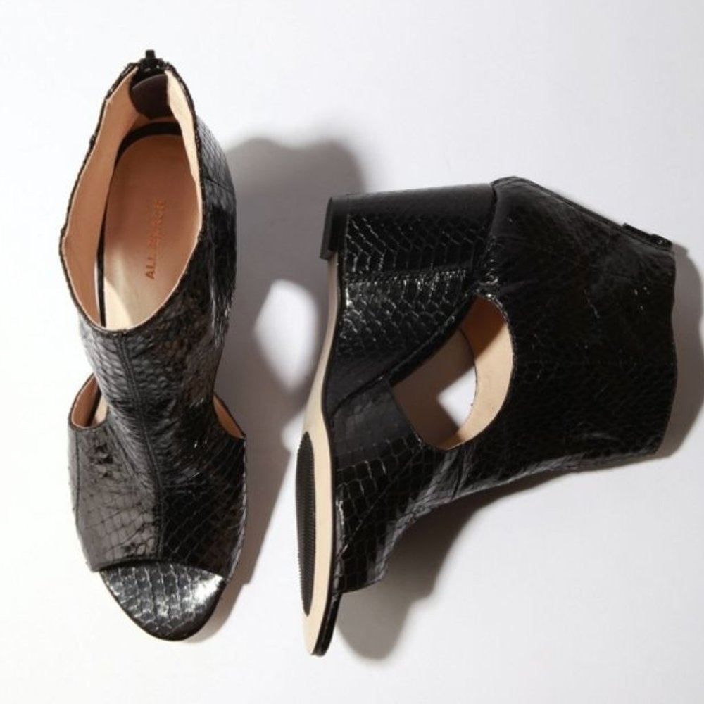 Patent leather snake print cut-out wedge booties